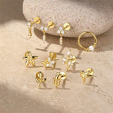 Elisa – Gold earrings with geometric design.