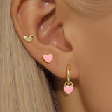 Isolda – Elegant gold earrings with structured design.