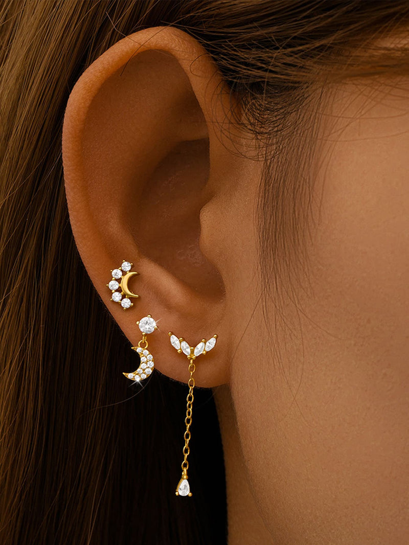 Carla – Gold earrings with an elegant curve.