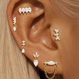 Ronja – Gold earrings with a subtle sparkle.