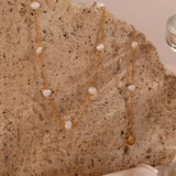 Greta – Gold Collar with Subtle Dots