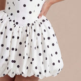 Short polka dot dress with voluminous skirt