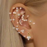 Johana-Marie – Gold Earrings with Textured Design.