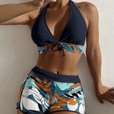 Bikini with mid-rise shorts and halter top