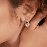 Leni – Gold earrings with cross and zirconia stones