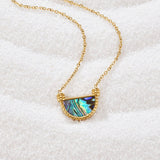 Elisabetta – Gold necklace with a medal-shaped pendant