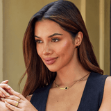 Selina – Circular earrings with a black center.