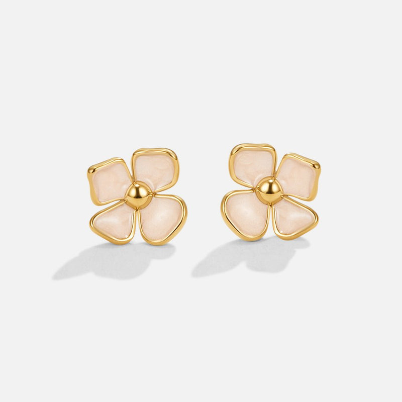 Greta – Round earrings with floral design.