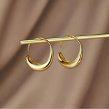 Gold Susanne Earrings with Structured Design