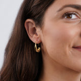 Karina – Mini circular gold earrings with an elegant design