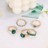 Melanie - Exclusive Ring Set with Emerald in Gold