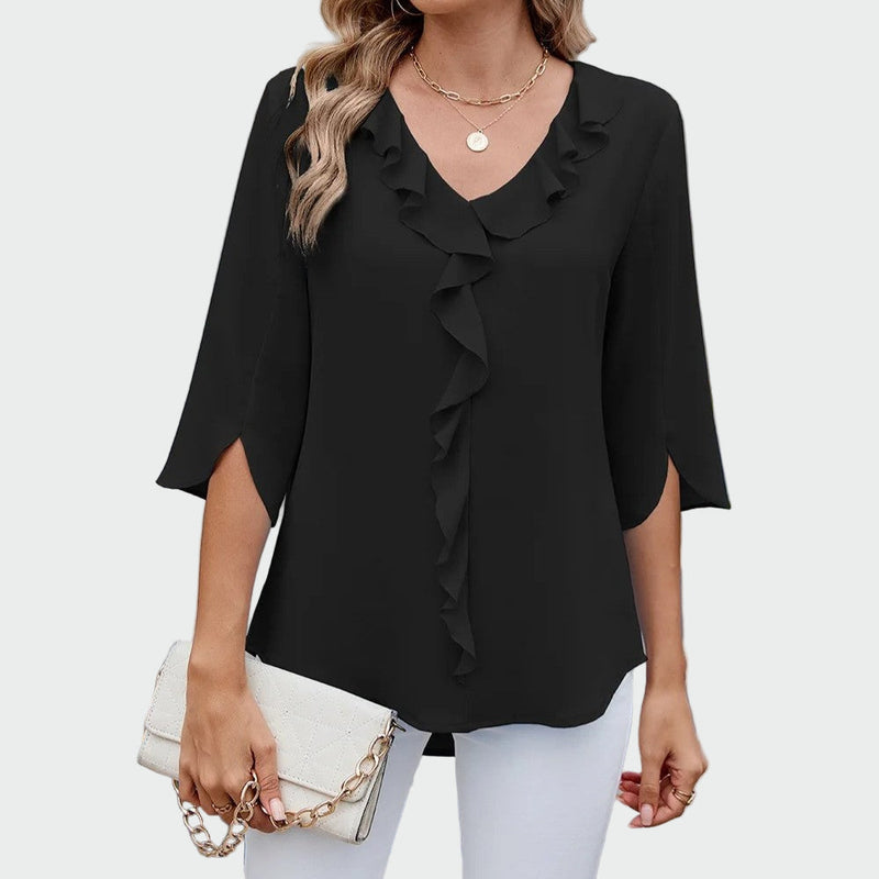 Elegant, sophisticated, and universal blouse