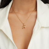 Selma – Gold necklace with heart pendant and gemstone