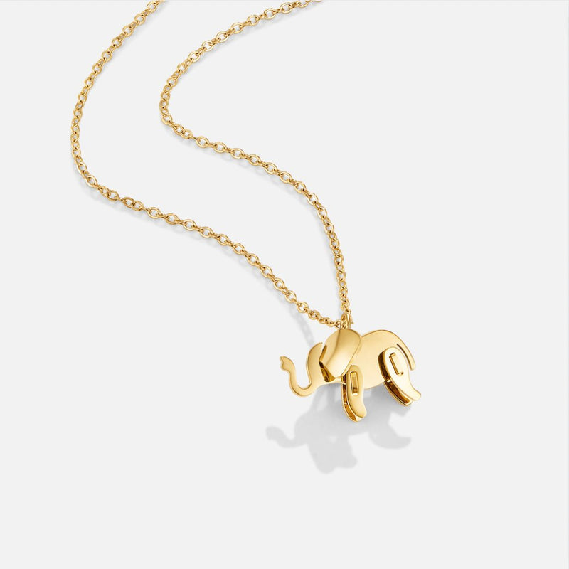 Luisa – Gold necklace with symmetrical floral design.