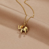 Luisa – Gold necklace with symmetrical floral design.
