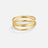 Valerie – Gold ring with intertwined line design.