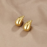 Anja - Gold Hoop Earrings with Elegant Curve