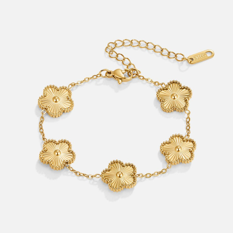 "Lucky Gold Bracelet" can be rewritten as "Gold Bracelet of Luck".