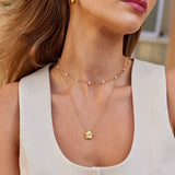 "Golden Luck Necklace" can be rewritten as "Luck Necklace in Gold".