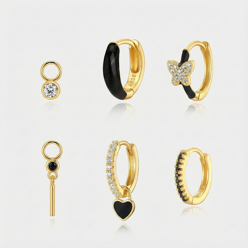 Theresia – Gold earrings with elegant curve.