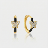 Theresia – Gold earrings with elegant curve.