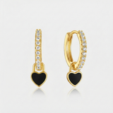 Theresia – Gold earrings with elegant curve.