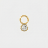 Theresia – Gold earrings with elegant curve.