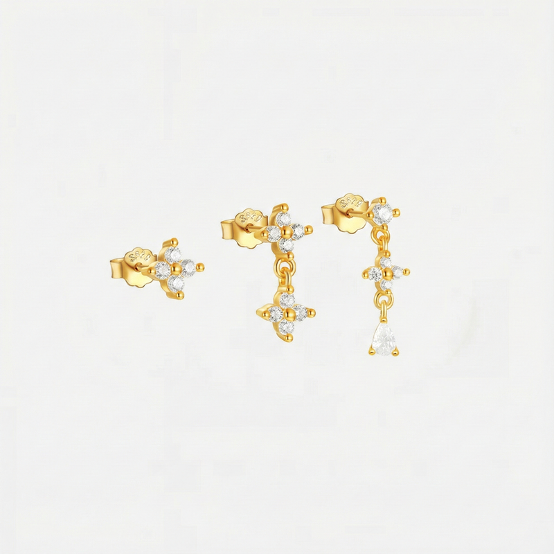Anika – Gold earrings with elegant movement.