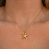 Francesca – Gold necklace with star-shaped pendant