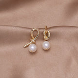 Tereza-Sofie – Silver earrings in curved design.