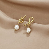 Theresa-Sophie Curved Silver Earrings