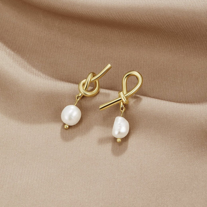 Theresa-Sophie Curved Silver Earrings