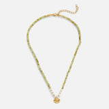 Amira – Golden necklace with elegant drop motif