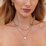Veronika – Golden necklace with a sparkling gem