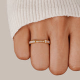 Lara – Thin gold ring with a subtle shine.