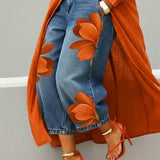 AMALIA | Casual Jeans with Artistic Orange Print