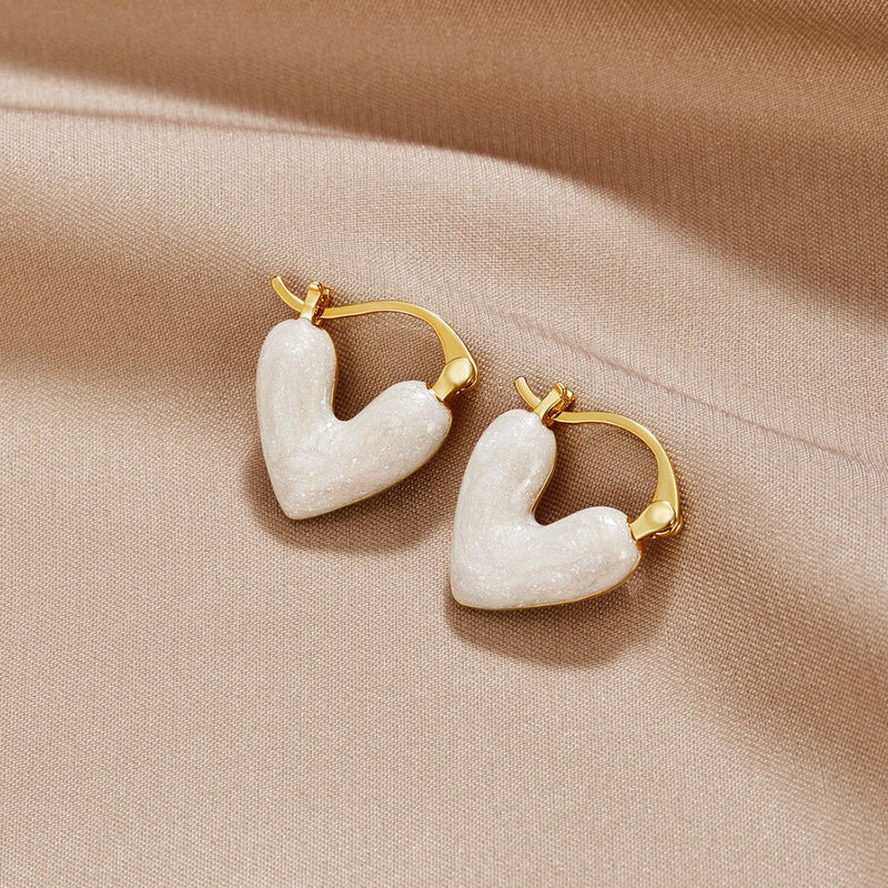 Klára-Luisa – Gold earrings adorned with delicate crystals.