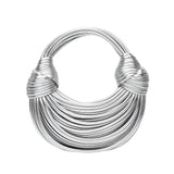 Golden sculptural design hard bag