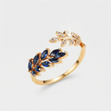 Aurelie – Red gold ring with blue gemstone