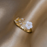Miriam – Floral Design Engagement Ring in White.