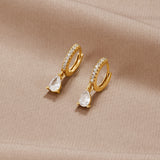Magdalena – Silver earrings with an open hoop design.