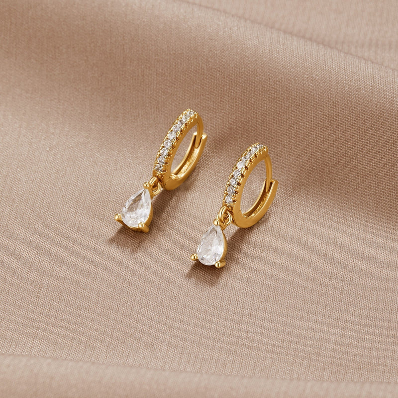 Magdalena – Silver earrings with an open hoop design.