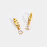 Magdalena – Silver earrings with an open hoop design.
